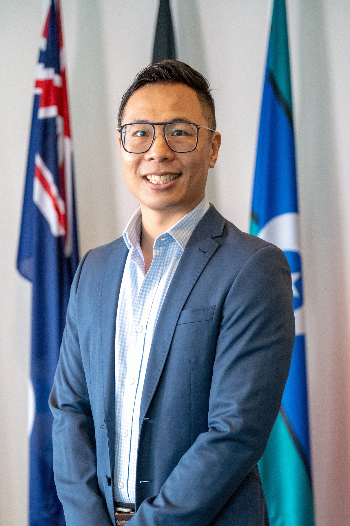 Headshot of Andrew Tran, Principal Trade and Investment Officer.