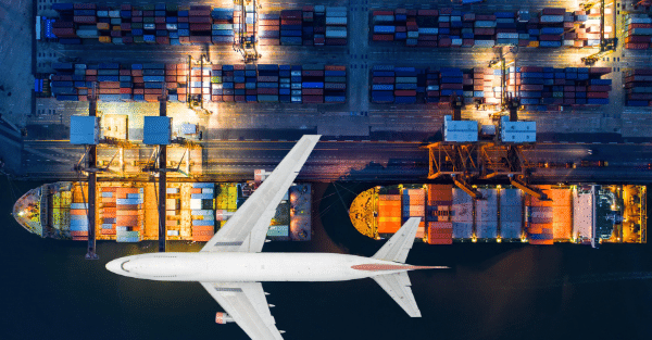 Aerial view of shipping containers and aircraft
