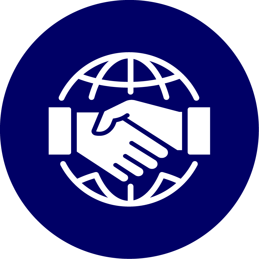 Hands shaking in front of a globe