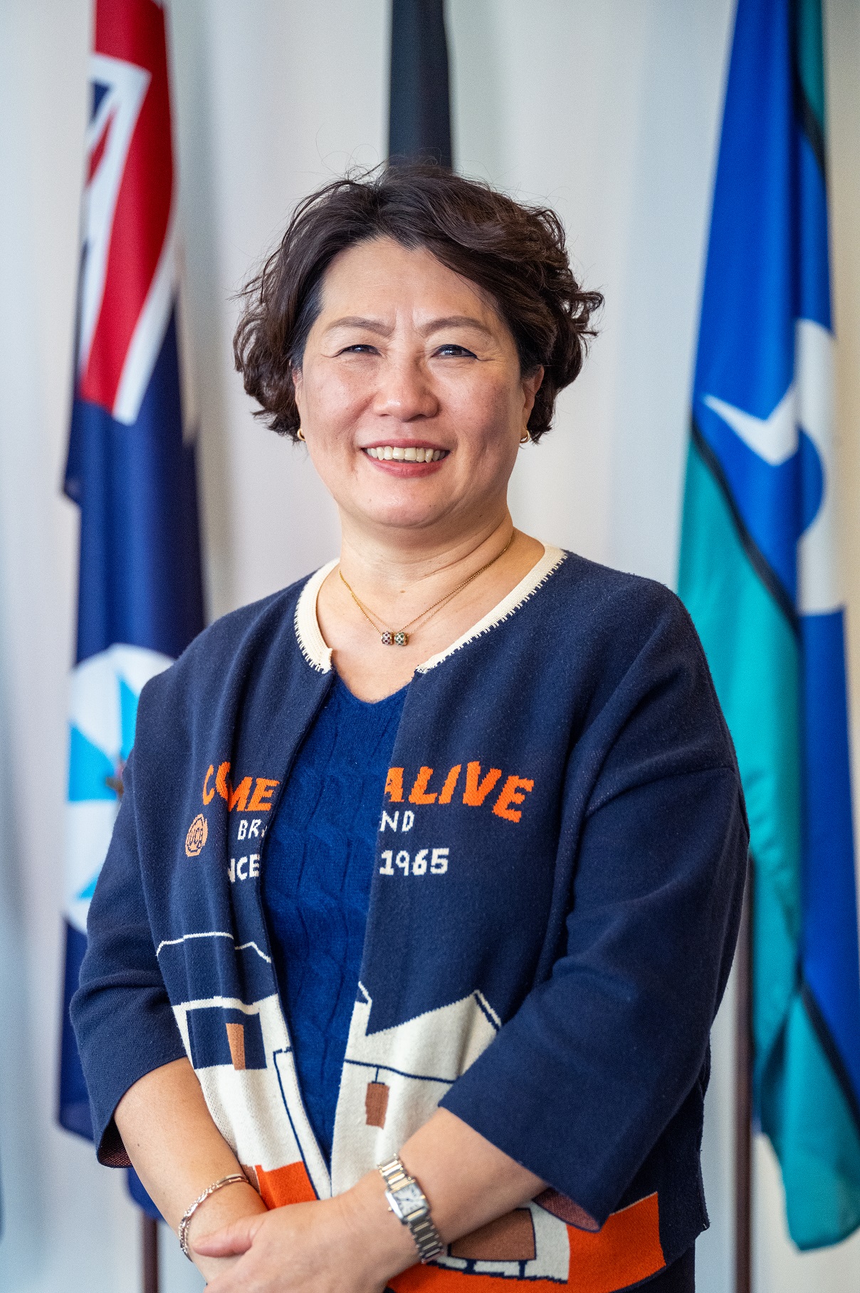 Headshot of Young-Mi Kim, Principal Trade and Investment Officer.